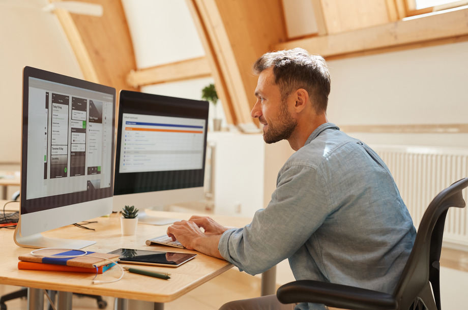 Programmer working with computers